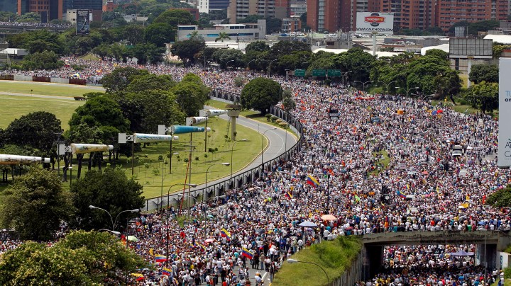 Opposition supporters take part in a rally against Venezuela's President Nicolas Maduro's government in Caracas